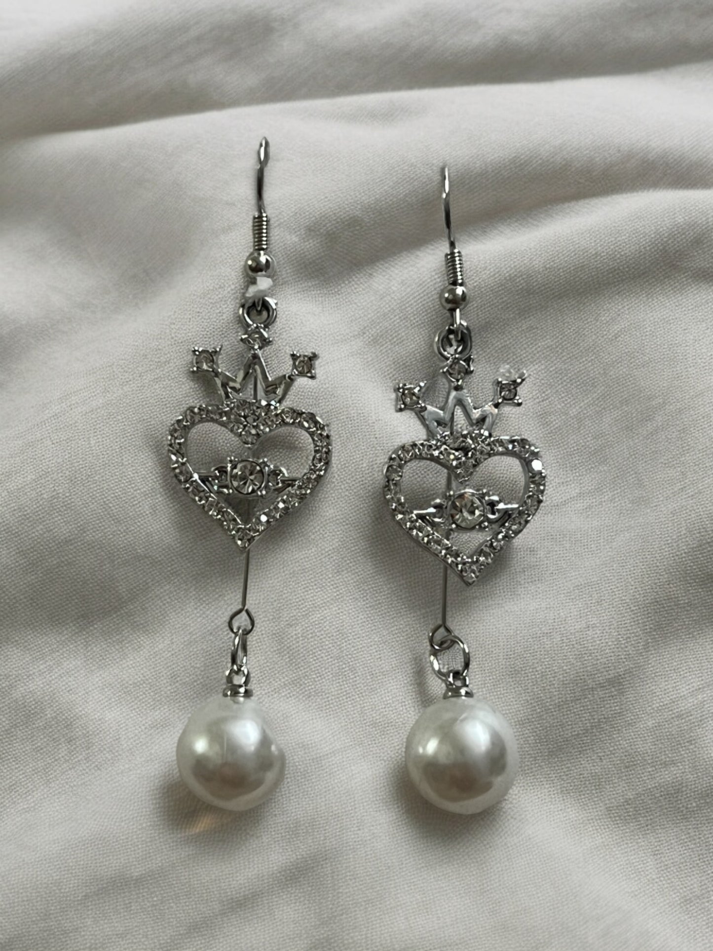 Ornafy Unveils Heart Shaped Diamond Earrings with Hanging Pearl